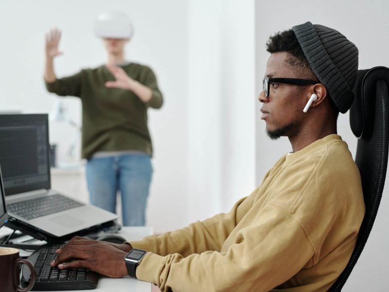 side-view-of-young-businessman-decoding-data-while-looking-at-computer-screen.jpg side-view-of-young-businessman-decoding-data-while-looking-at-computer-screen.jpg