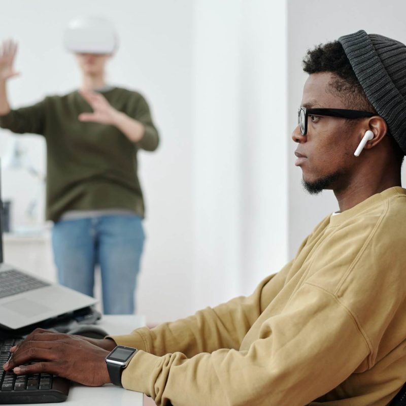 side-view-of-young-businessman-decoding-data-while-looking-at-computer-screen.jpg side-view-of-young-businessman-decoding-data-while-looking-at-computer-screen.jpg